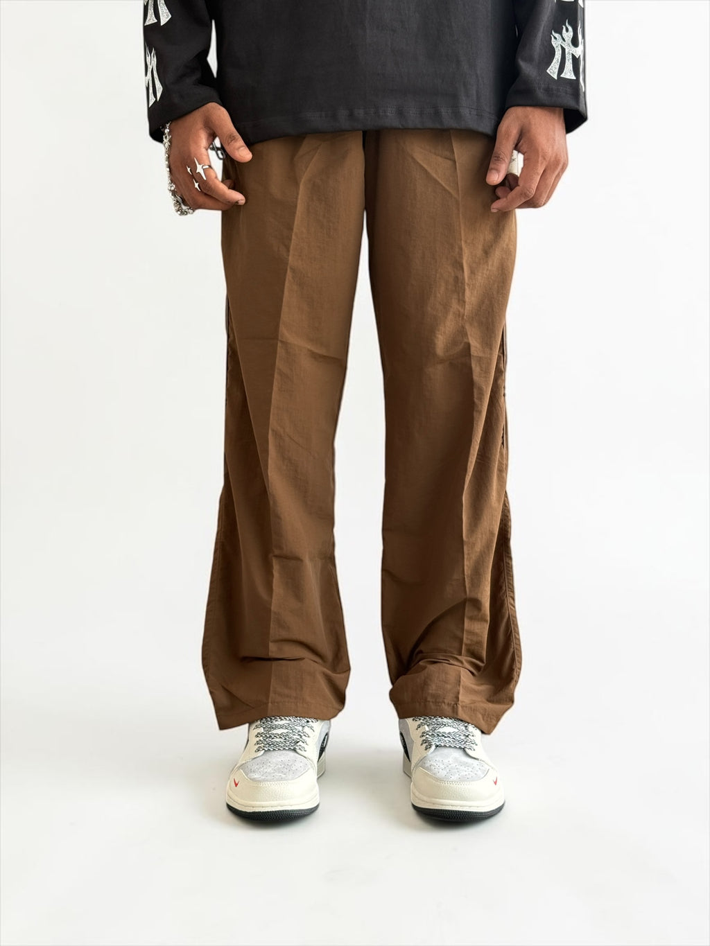 Premium straight-fit track pants for a clean, modern look. full brown